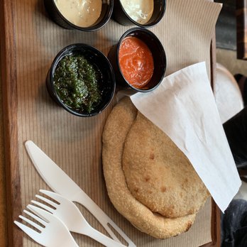 Brassica - Different sauces and pita - Mediterranean Near Me - Columbus, Ohio