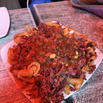 La Banquise - Poutine with smoked meat - Poutineries Near Me - Montreal, Quebec