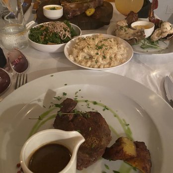 Dave & Jerry's Island Steakhouse - 24 oz. T-bone, truffle Mac & cheese, kale, 12 oz. Lobster tail, and 8oz. Filet Mignon - Steakhouses Near Me - Saint John, Virgin Islands Dave & Jerry's Island Steakhouse - 24 oz. T-bone, truffle Mac & cheese, kale, 12 oz. Lobster tail, and 8oz. Filet Mignon - Steakhouses Near Me - Saint John, Virgin Islands