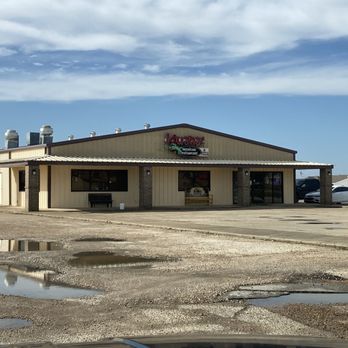 Iguana's Mexican Restaurant - front of restaurant (beware that portions of the surface of the parking lot are not suitable for cars) - Mexican Near Me - Harrisburg, Arkansas
