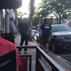 J T Carrington's - Please be more ignorant as I'm sitting at the restaurant 4 feet away inhaling the smoke from your cancer stick.