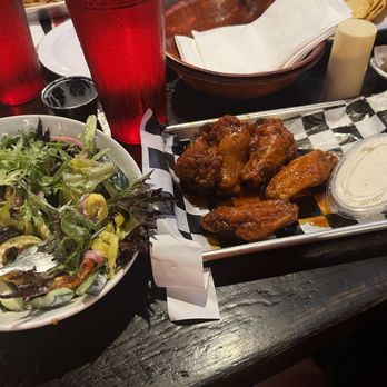 Wingnutz Bar & Grill - Wings and a Side House Salad - Sports Bars Near Me - Williamsville, New York