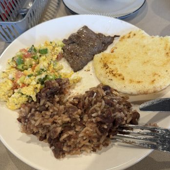 Latin O Cafe - The second item on the breakfast menu with steak, I got my eggs "en perico" scrambled with tomato and onions really good! - Breakfast & Brunch Near Me - Hudson, Florida