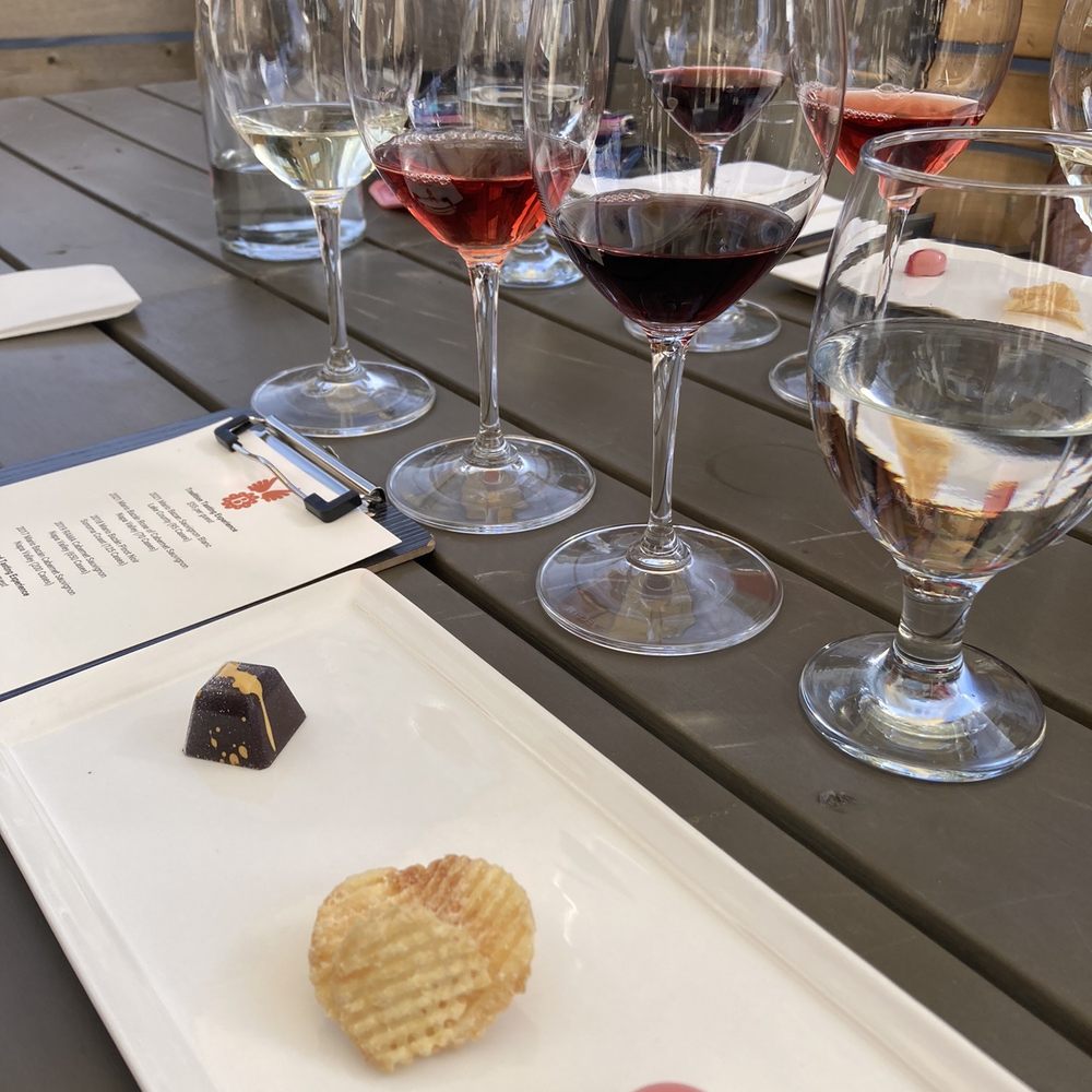 Bazán Cellars - Chocolate, manchego cheese chips, and a raspberry ganache paired beautifully with Bazan wines! - Wine Tasting Room Near Me - Napa, California Bazán Cellars - Chocolate, manchego cheese chips, and a raspberry ganache paired beautifully with Bazan wines! - Wine Tasting Room Near Me - Napa, California