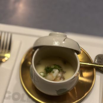 Golden pig - a bowl of soup on a plate - Korean Near Me - Honolulu, Hawaii Golden pig - a bowl of soup on a plate - Korean Near Me - Honolulu, Hawaii