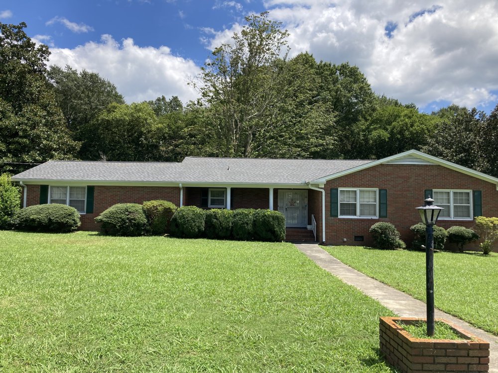Slide of Atlas Roofing and Construction