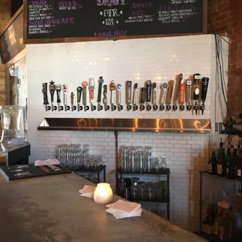 Off the Record - a row of beer taps on a bar - Sports Bars Near Me - Dallas, Texas Off the Record - a row of beer taps on a bar - Sports Bars Near Me - Dallas, Texas