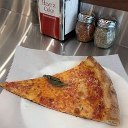 Plain slice $4 plus tax Plain slice $4 plus tax
