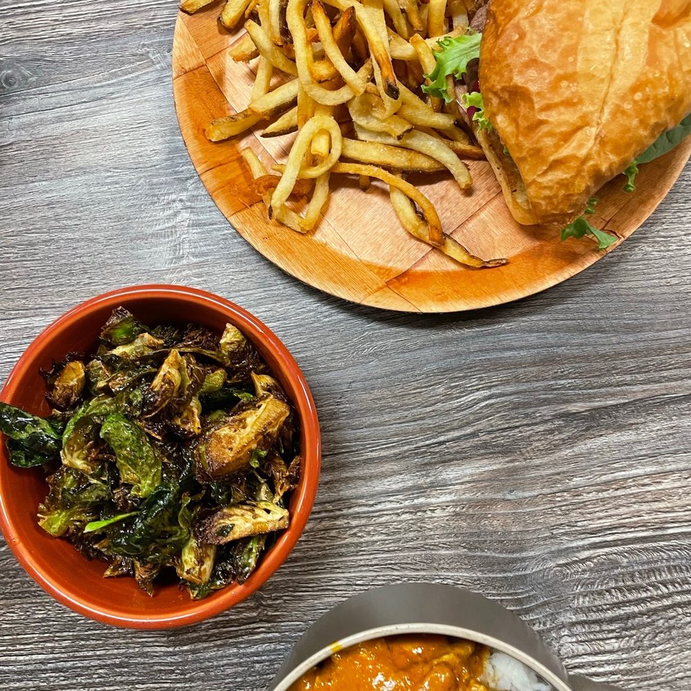 Wanderlust Creativefoods - a plate of food and a bowl of fries - Indian Near Me - Fayetteville, West Virginia Wanderlust Creativefoods - a plate of food and a bowl of fries - Indian Near Me - Fayetteville, West Virginia