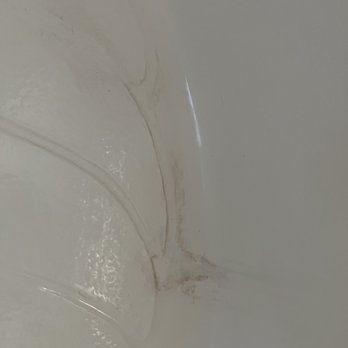 Magic Surface - Before  Damaged area in tub - Refinishing Services Near Me