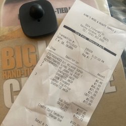 King's Wigs & Beauty Supply - Security tag left because they were in a rush