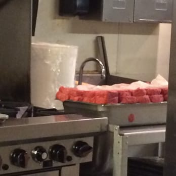 Good Stuff Eatery - Raw beef sitting out over an operational sink. Can I say food borne illness! - Burgers Near Me - Washington, DC, District of Columbia