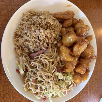 Sun China Chinese Restaurant - Orange Chicken Lunch Combo with pork fried rice and pork chow mein. - Cantonese Near Me - Reedley, California Sun China Chinese Restaurant - Orange Chicken Lunch Combo with pork fried rice and pork chow mein. - Cantonese Near Me - Reedley, California