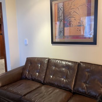 Aspire Dental - Comfortable sofa in waiting room with nice art - General Dentistry Near Me - Portland, Oregon