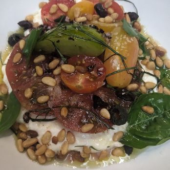 Crawford & Son - Heirloom tomatoes over whipped mozzarella with pine nuts - New American Near Me - Raleigh, North Carolina