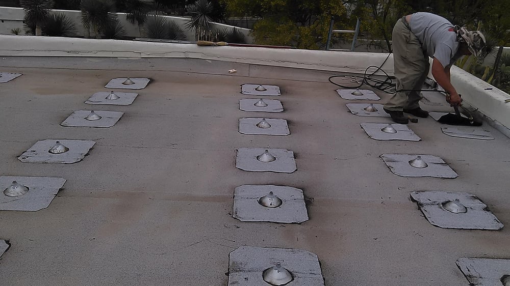 Slide of Espino Roofing