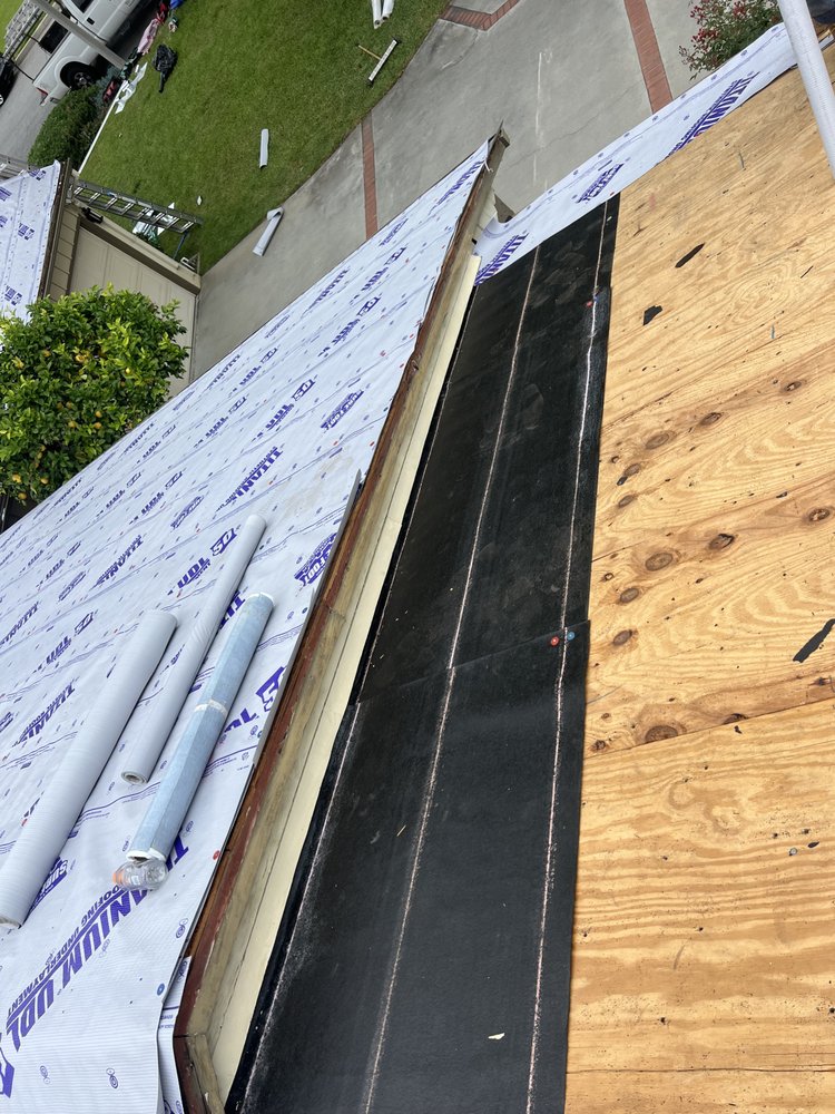 Slide of Heritage Roofing Solutions