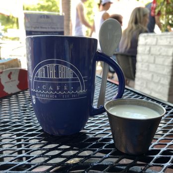 The Bridge Cafe - Coffee mug with integrated spoon holder! - Breakfast & Brunch Near Me - Delray Beach, Florida The Bridge Cafe - Coffee mug with integrated spoon holder! - Breakfast & Brunch Near Me - Delray Beach, Florida