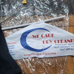 We Care Dry Cleaners - The plastic and paper/hanger that the clerk grabbed and tried to throw away that my ruined pants were wrapped in