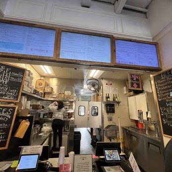 Fish District - menus on the wall of a restaurant - Fish & Chips Near Me - Solana Beach, California