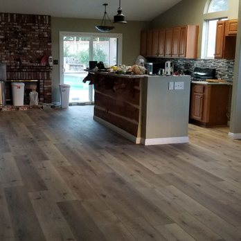Quality Floors For Less - Kitchen and dining area, floor looks darker than it really is... - Flooring Near Me - Hesperia, California Quality Floors For Less - Kitchen and dining area, floor looks darker than it really is... - Flooring Near Me - Hesperia, California