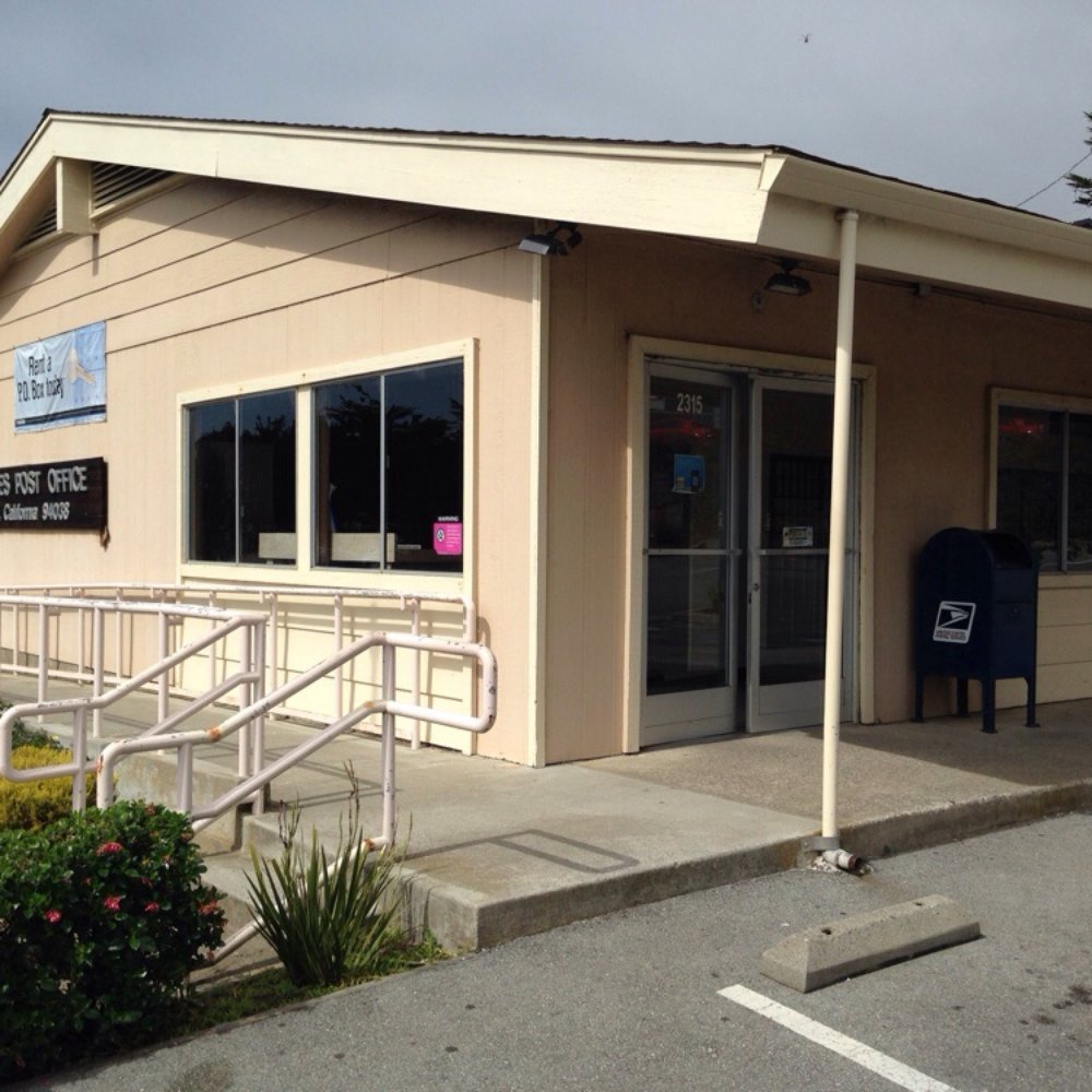 Post Office is next door to Odyssey Pizzeria and Cafe. Post Office is next door to Odyssey Pizzeria and Cafe.