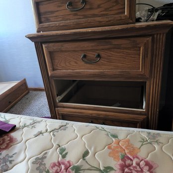 Move 4 Less - My broken nightstand that was dropped on the stairs. One of the rollers is missing and the other fell off, so I can't put my drawer back in. - Movers Near Me - Las Vegas, Nevada Move 4 Less - My broken nightstand that was dropped on the stairs. One of the rollers is missing and the other fell off, so I can't put my drawer back in. - Movers Near Me - Las Vegas, Nevada
