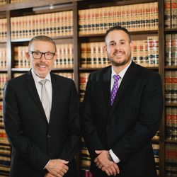 Wallin & Klarich - Criminal Defense Attorneys - Fighting for justice runs in the family! Paul (left) and Matt (right) Wallin, together in the Wallin and Klarich library.