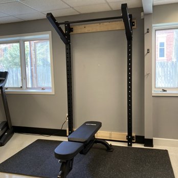 Bolt Handyman Services - Wall-mounted weight lifting rack - Handyman Near Me Bolt Handyman Services - Wall-mounted weight lifting rack - Handyman Near Me