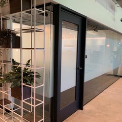 Industrious - Outside conference room with privacy film.