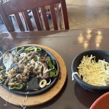 Guadalajara Grill Mexican Restaurant - Steak fajitas with a side of cheese - Mexican Near Me - Concord, California