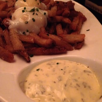 Salty Sow - Triple fried duck fat fries with 110 minute eggs and cold béarnaise sauce. - American Near Me - Austin, Texas