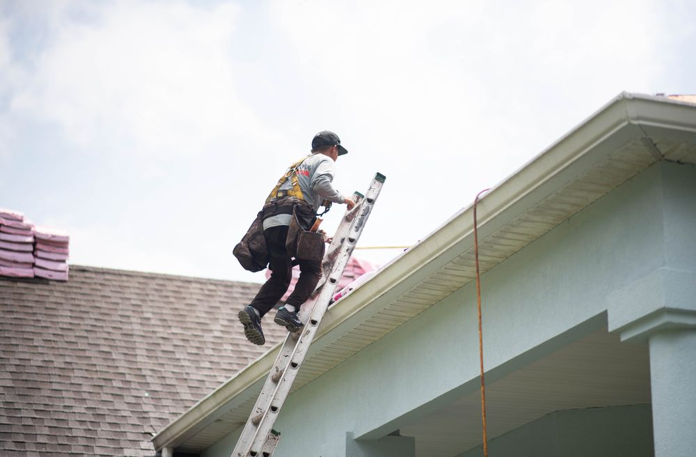 Slide of J Adams Roofing