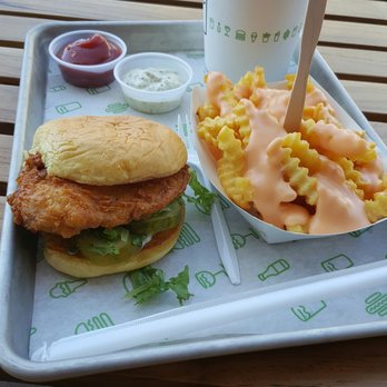 Shake Shack Glendale - Chicken Burger, cheese fries and strawberry shake. The cheese on the fries was very fake tasting as it looked. $17 overpriced - Burgers Near Me - Glendale, California