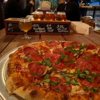 Pinthouse Pizza - Pepperoni & Basil pizza, flight of beer - Pizza Near Me - Austin, Texas Pinthouse Pizza - Pepperoni & Basil pizza, flight of beer - Pizza Near Me - Austin, Texas