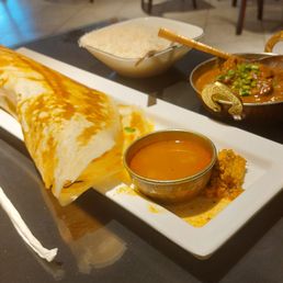 Masala Dosa (this big ol' crepe); lamb curry with basmati rice.