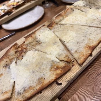 Table 47 - Cheese and truffle pizza I believe. Really good but could of used a little more bubbly roasted goodness - Seafood Near Me - Gig Harbor, Washington