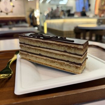 Zaman Coffee House - Opera cake - Coffee & Tea Near Me - Syracuse, New York Zaman Coffee House - Opera cake - Coffee & Tea Near Me - Syracuse, New York