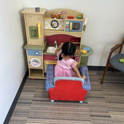 Kenmore Pediatric Dentistry - Mi bebé jugando mis tras espera su turno