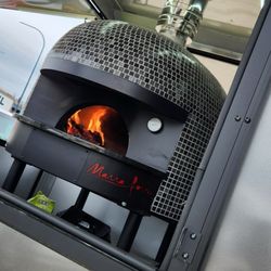 Wolfe It Down Pizza - Wood burning pizza oven.