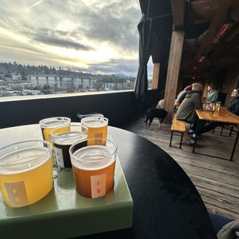 Ferment Brewing Company - Beer flight on the deck. - Brewpubs Near Me - Hood River, Oregon