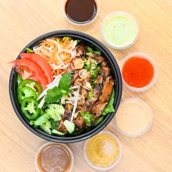 V-Roll Vietnamese Rolls & Bowls - Grilled Lemongrass Chicken rice bowl with all of our house-made sauces