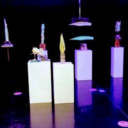 Larry Ortega's creations looked like they were swimming in the black light