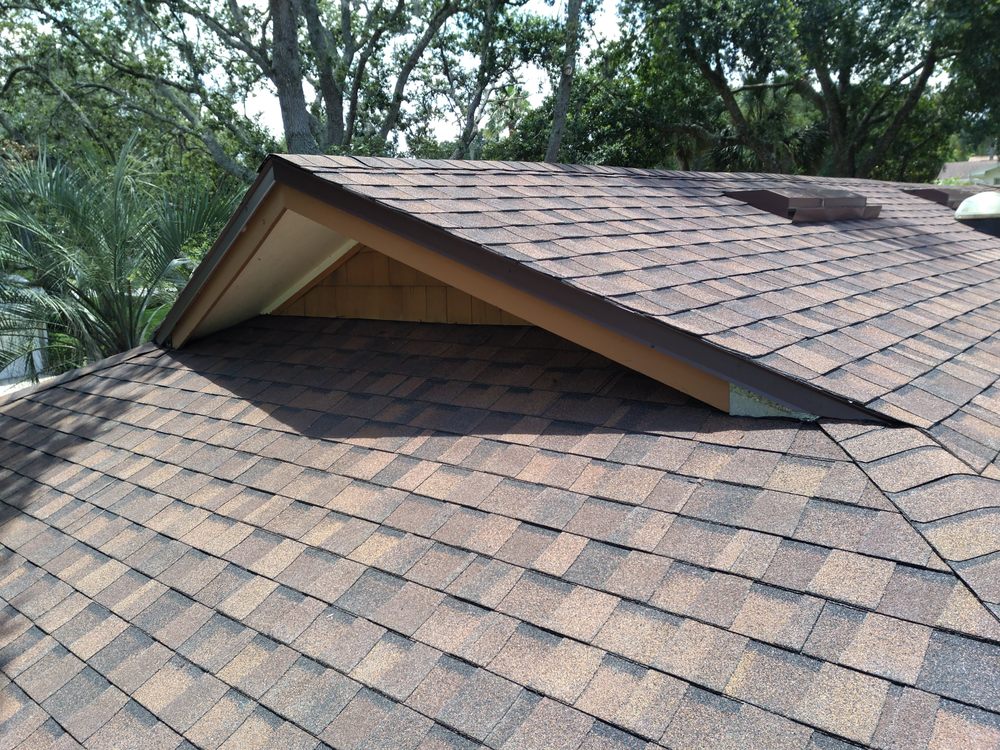 Slide of Century Roofing Specialists