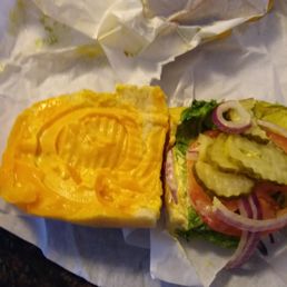 This is the COLD Cheese sandwich. The MELTED cheese is on the left, it's not mustard. This is the COLD Cheese sandwich. The MELTED cheese is on the left, it's not mustard.