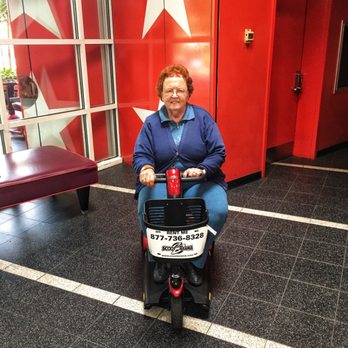 Scootarama - Ms. Arnold checking in on her scooter rental Disney World at the Allstar Movies Resort. - Mobility Equipment Sales & Services Near Me - Orlando, Florida