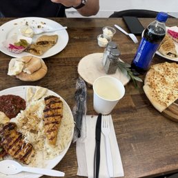 Chicken kabob platter, beef & chicken shawarma sandwiches, fresh bread, manoushi (cheese pie)