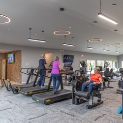 Pearl Physical Therapy - Inside our Medical Fitness Facility featuring Technogym's cardio equipment with heart rate monitoring