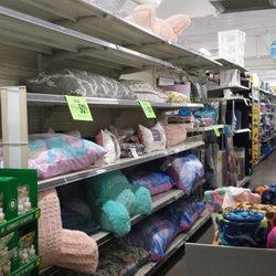 Dollar General - Home decor too, though not at the $1 price point.