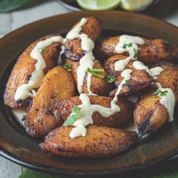 Tasty Caribbean Seafood - a plate of grilled plantains - Food Trucks Near Me - Humble, Texas
